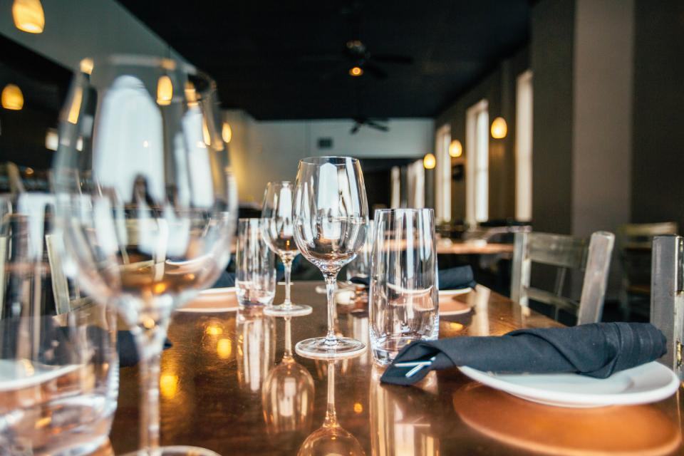 Glasses set along the bar